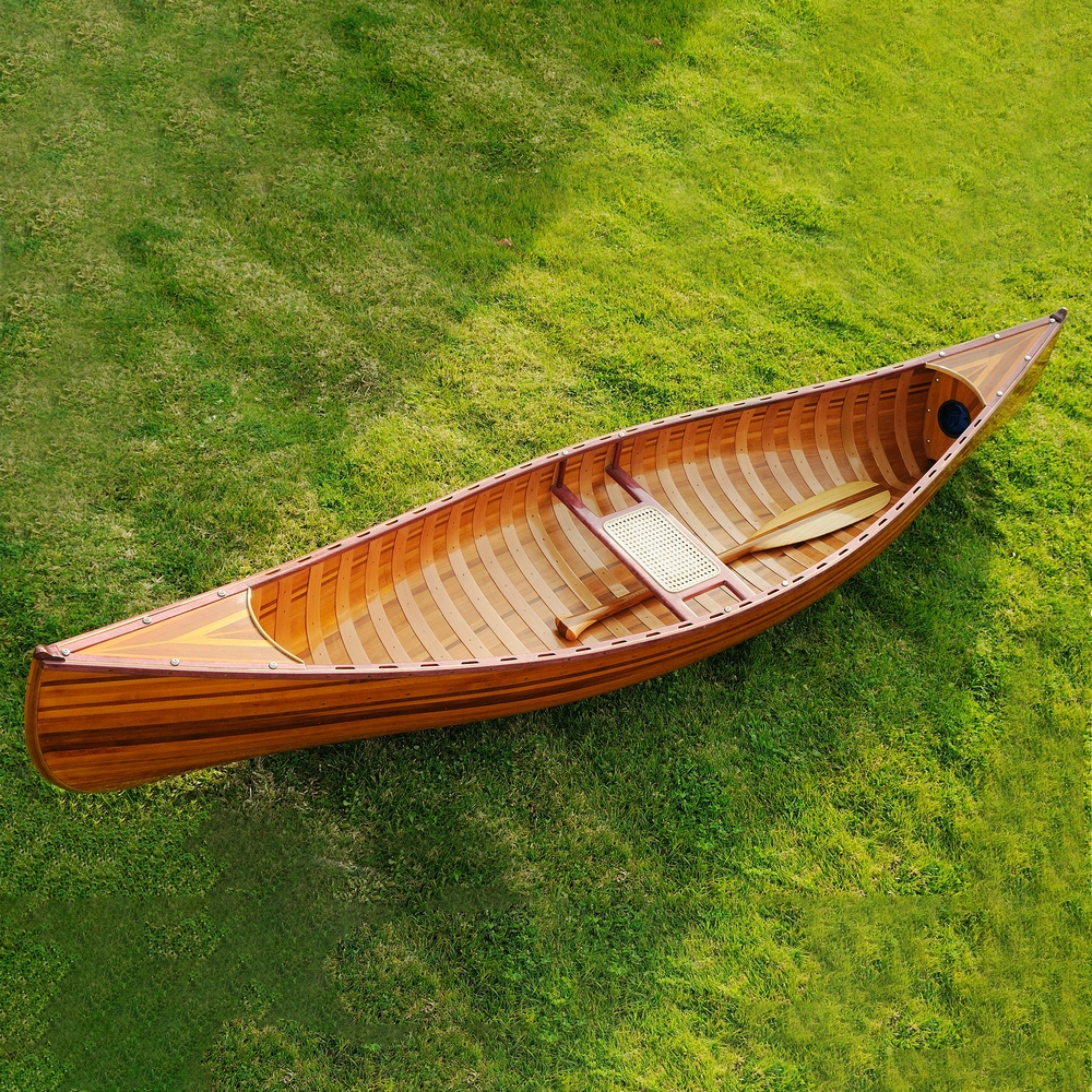 K034 Wooden Canoe With Ribs Curved bow 10 ft Display-Only K034-WOODEN-CANOE-WITH-RIBS-CURVED-BOW-10-FT-DISPLAYONLY-L01.WEBP